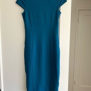 Turquoise body con zippers back dress. Size small